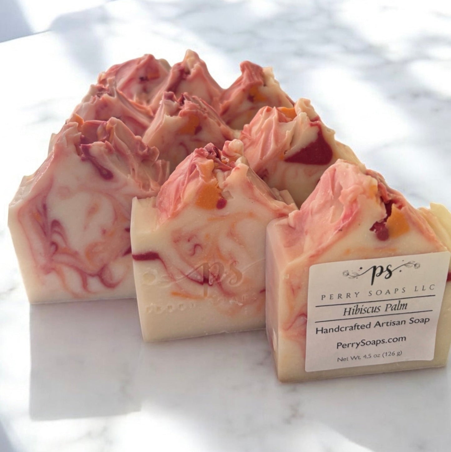 white soap with peach and red