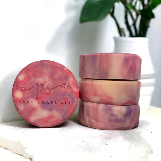 round soap bar with purple pink and white swirls