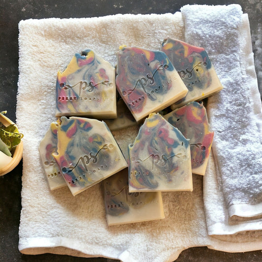 white soap bar with green, red and yellow swirls